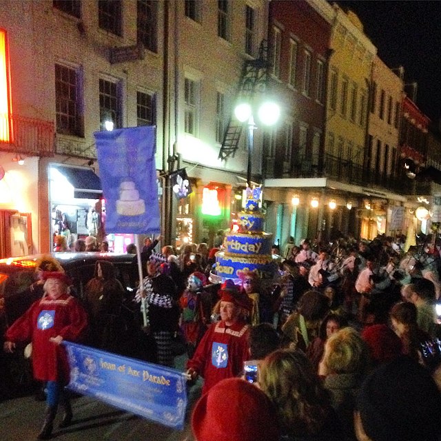 The Joan of Arc parade rumbles down the streets of the French Quarter in New Orleans on January 6, 2015. Twelfth Night signifies the end of the Christmas season across the world. In Louisiana, it also marks the beginning of the Carnival season. Photo by Bart Everson on Creative Commons.