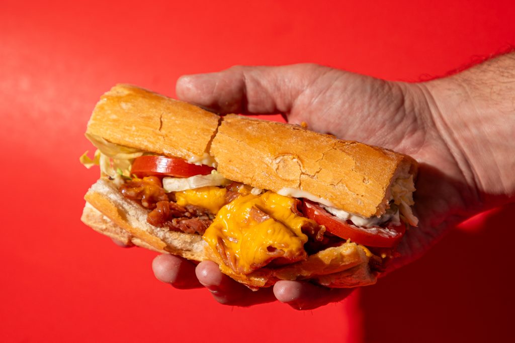 Mahony’s Poboys uses Chisesi ham to make their root beer-glazed ham and cheese poboy.