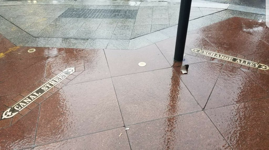 Exchange Place begins at Canal Street, though the sign calls the small street by its older name, Exchange Alley.