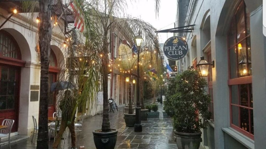A rainy afternoon is still charming on Exchange Place between Bienville and Conti streets.